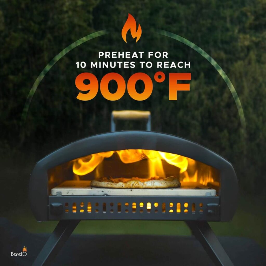 Bertello Grande 16-inch pizza oven preheating to 900°F, showing active flames and pizza stone inside the oven
