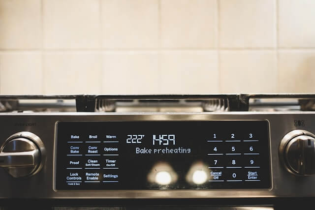 oven display showing preheating at 227°C before fully reaching temperature
